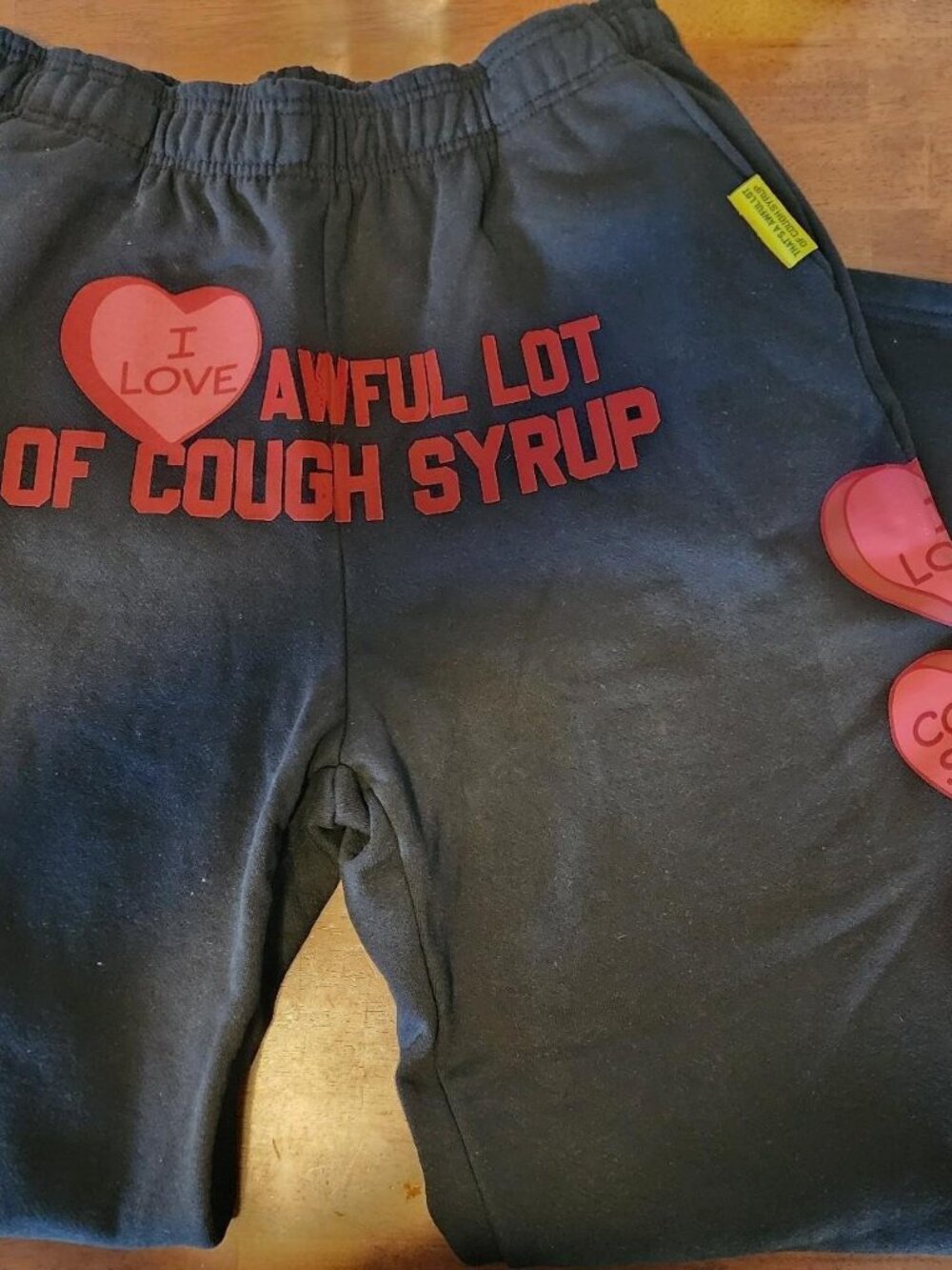Black and pink "I love awful lot of cough syrup" sweatpants #loungewear #valenti